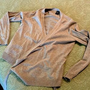Size medium, Gap wrap sweater.  Never worn, perfect condition.  Waist length.